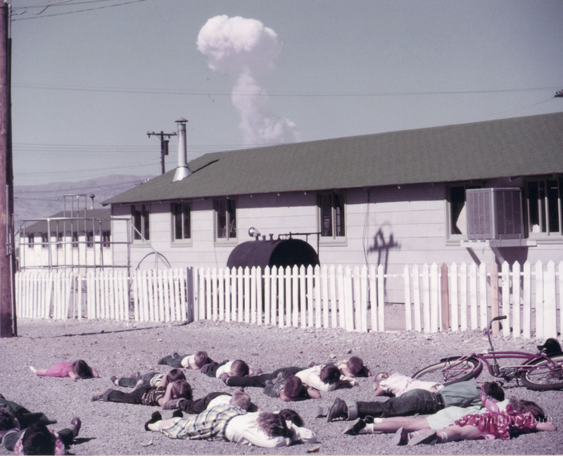 Children practicing “duck and cover.”